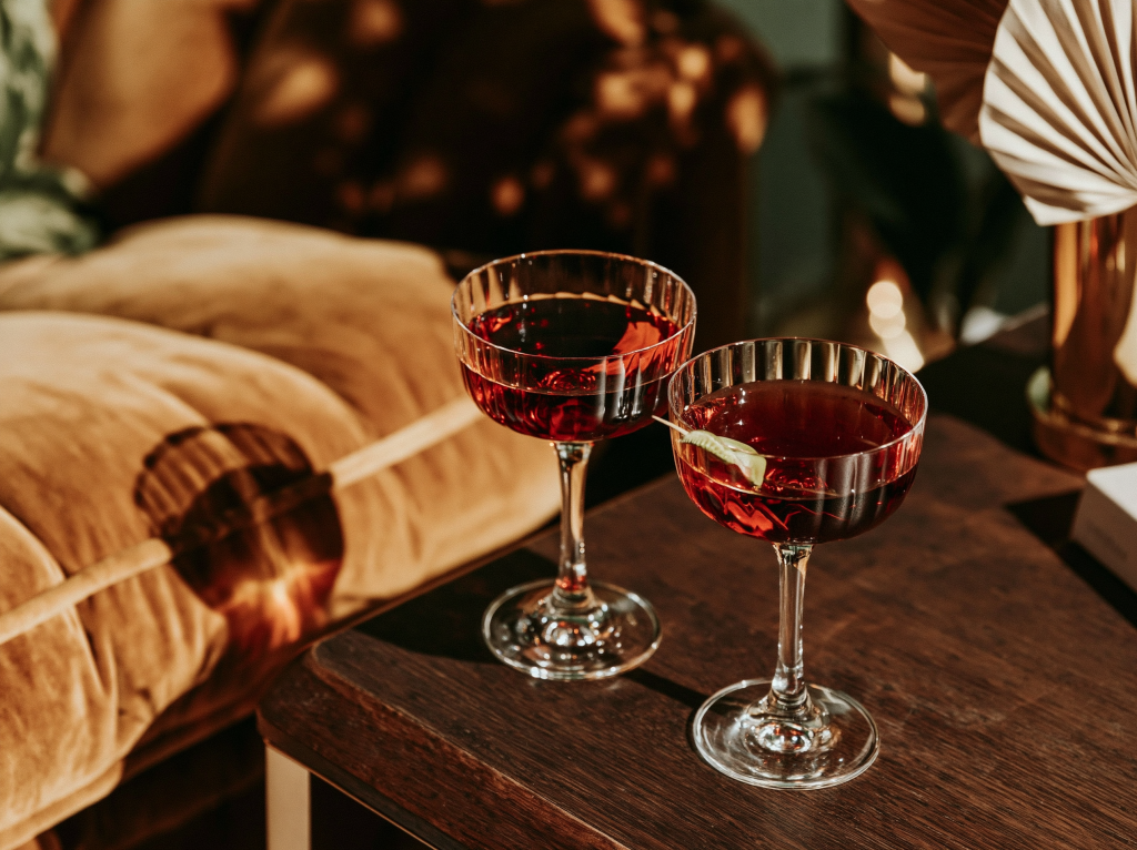 Matching cocktails served after hours in an intimate lounge